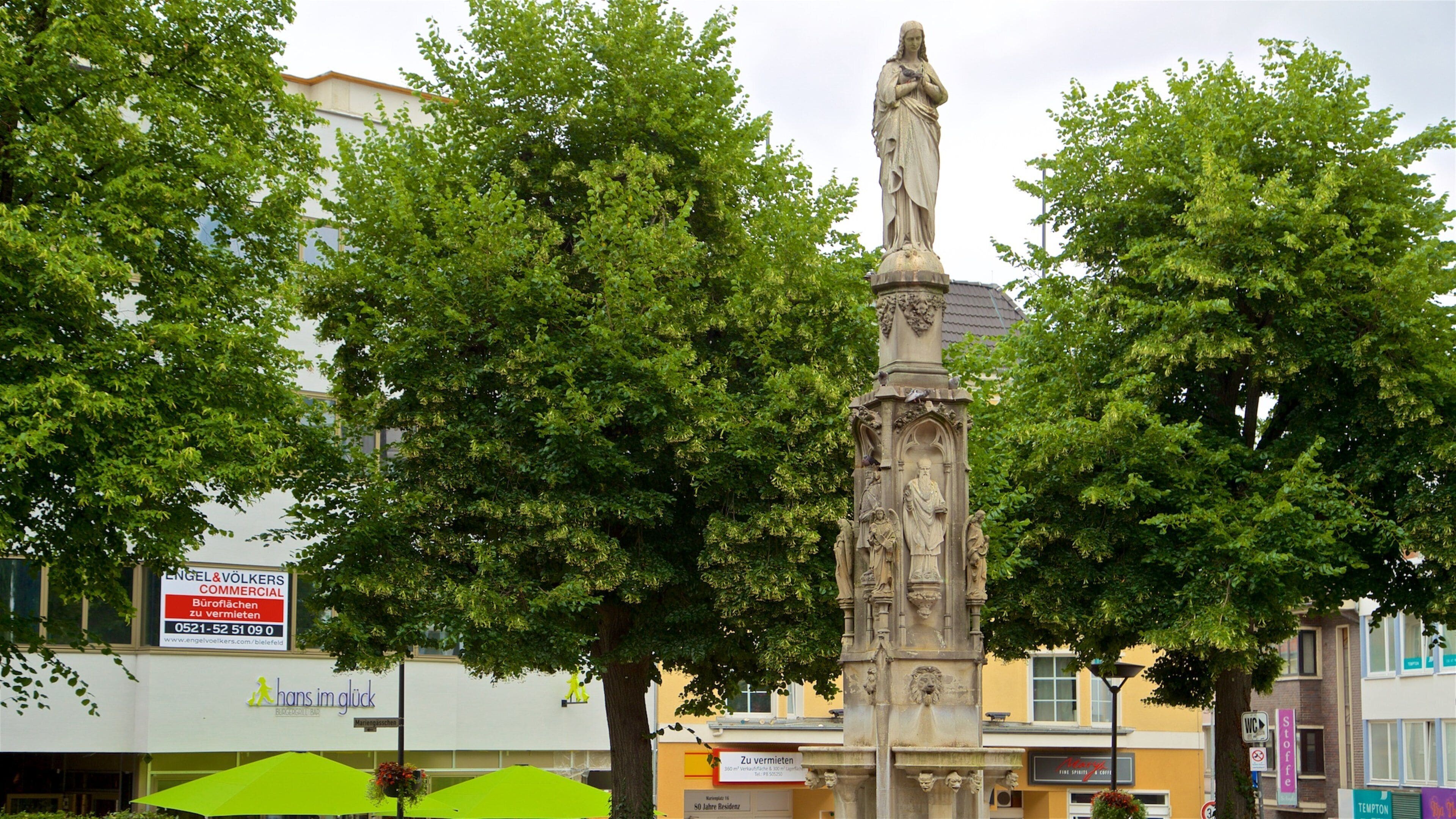 Marienplatz Paderborn featuring a statue or sculpture and a fountain