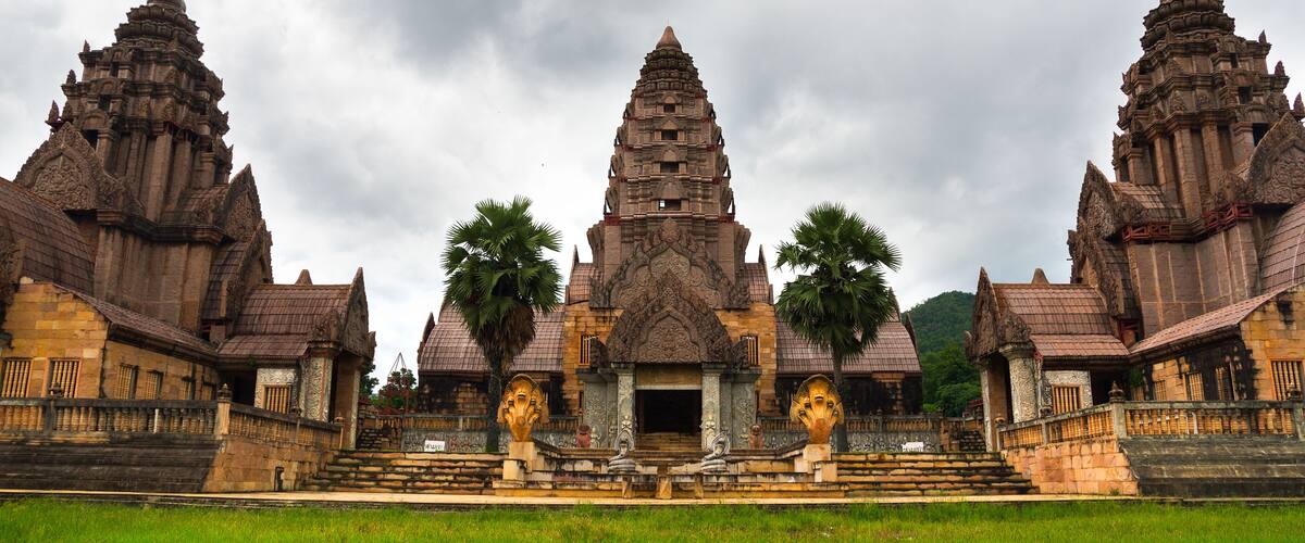 A temple with three towers and a central entrance.