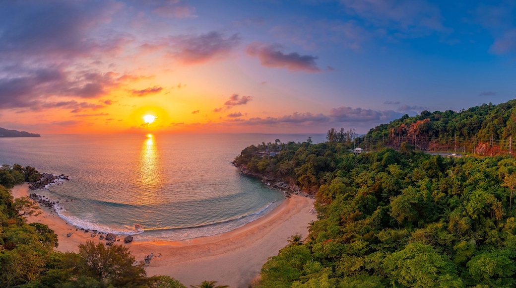 Aerial top view panorama sunset Laem Sing beach with sea of Phuket paradise. Concept tropical travel photo Surin, Thailand