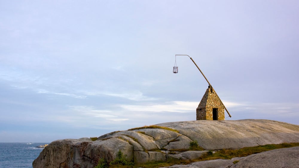 BPXEGT A traditional stone lighthouse on the coast at Verdens Ende, Tjome, Norway.. Image shot 07/2010. Exact date unknown.
