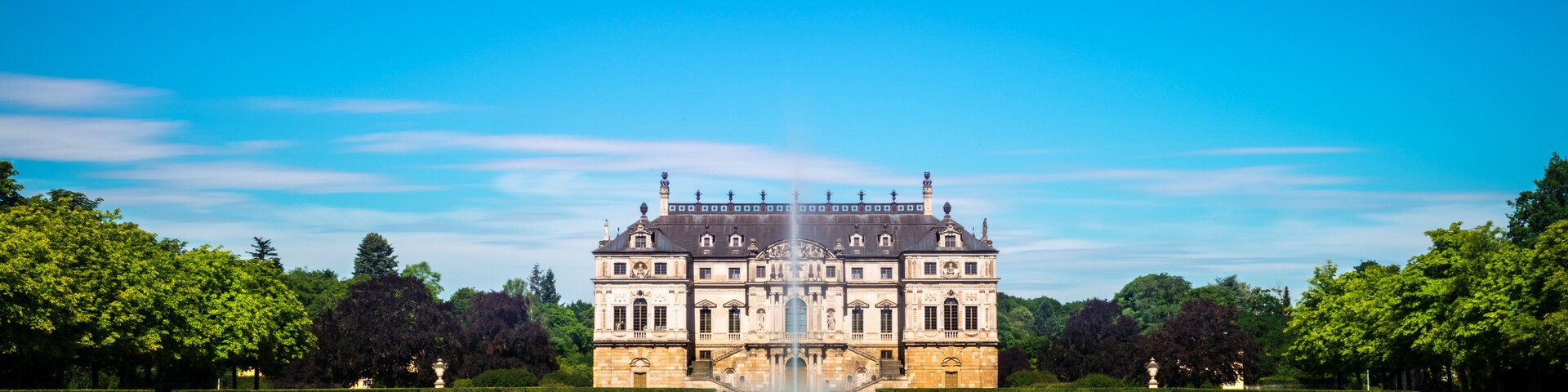 Baroque palace (Sommerpalais) in the vast gardens of the public Grosse Garten in Dresden, Germany. Monochrome, long exposure.; Shutterstock ID 699536473
