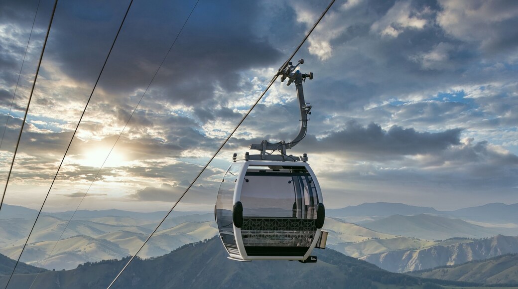 Shot of cableway. Beautiful sunset sky background