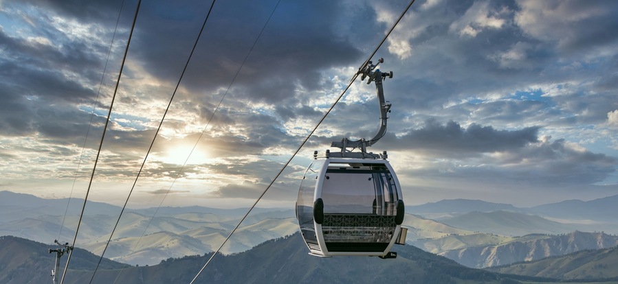 Shot of cableway. Beautiful sunset sky background