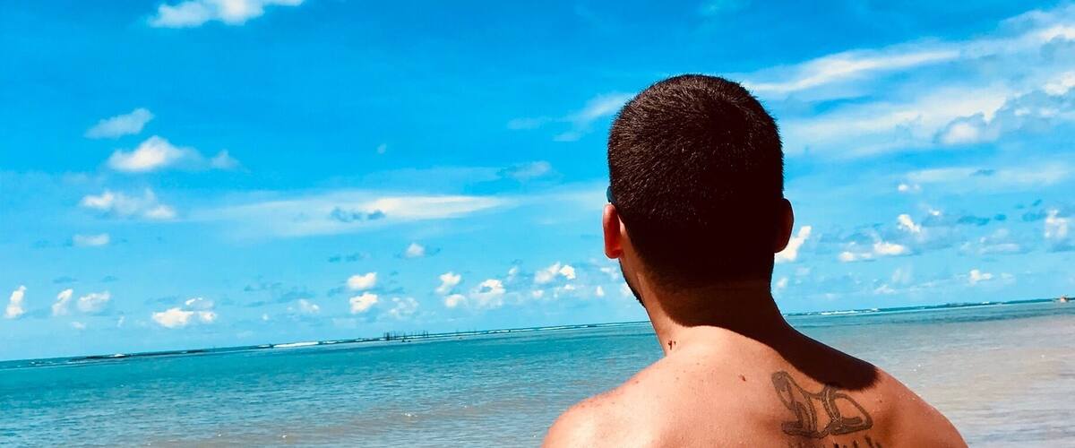 Urban beach with calm water and cheap snack options.