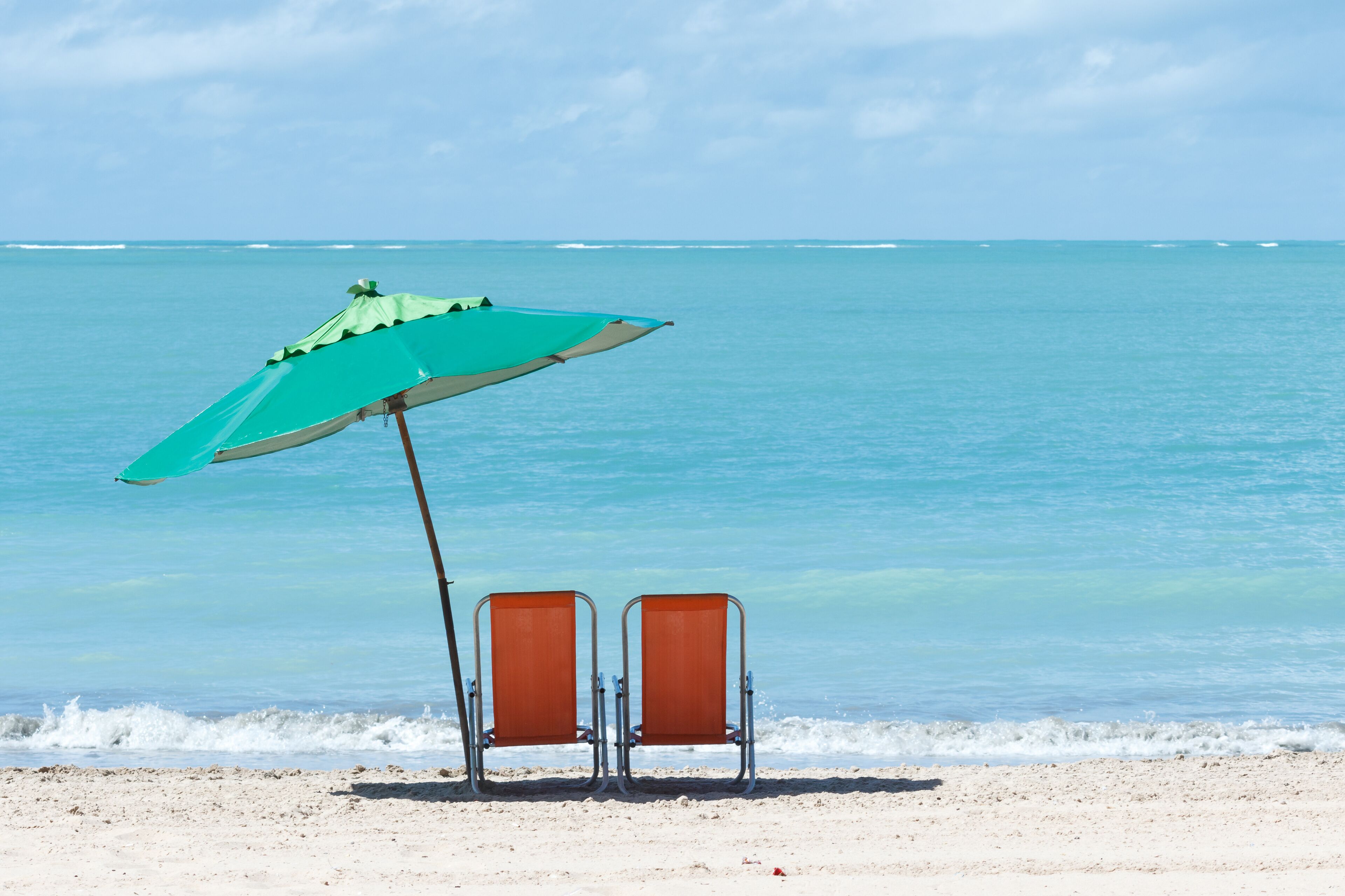 chairs and umbrella at Ponta Verde, Maceio, Alagoas, Brazil