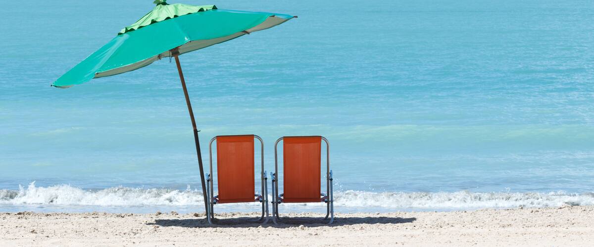 chairs and umbrella at Ponta Verde, Maceio, Alagoas, Brazil