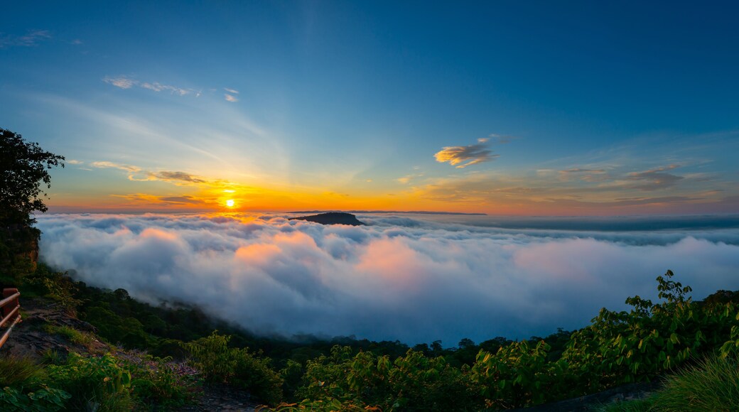 Panorama Beautiful Clouds and fog above mountain, beautiful morning sunshine landscape at Pha Mo i Daeng Phra Wihan National Park. Sisaket province,Thailand,ASIA.