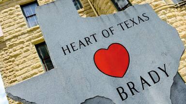 A torn map of Texas with 'Heart of Texas' and 'Brady' written on it.