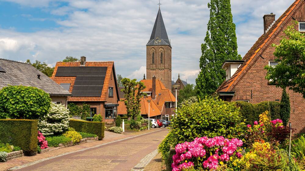 Village of Zeddam in Province Gelderland. Scenery with St. Oswaldus church