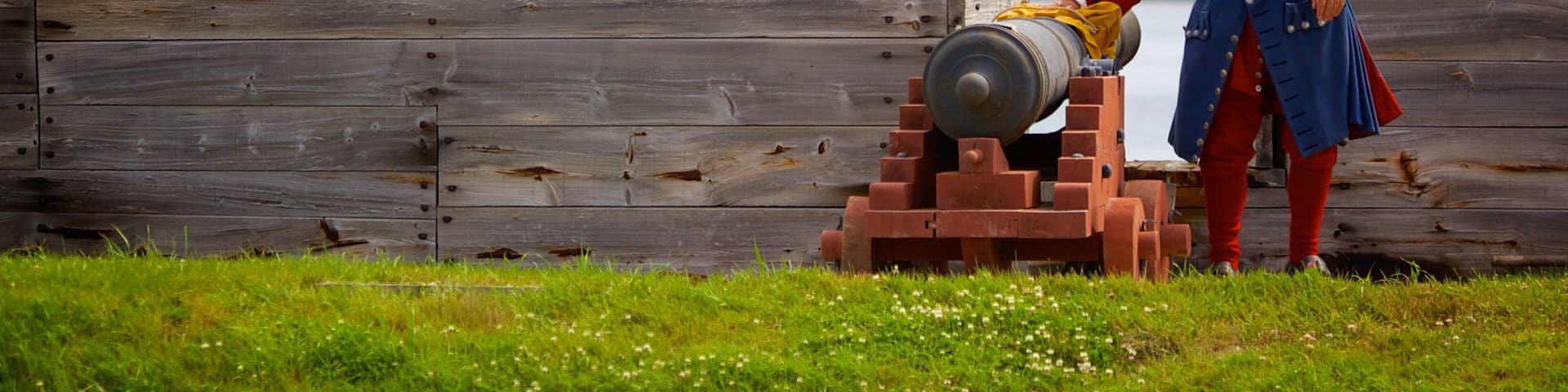 Fortress Louisbourg National Historic Site showing a statue or sculpture and military items