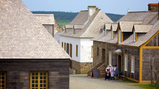 Fortress Louisbourg National Historic Site featuring a house, heritage architecture and a small town or village
