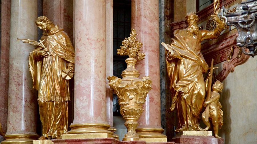 Gyor Benedictine Church featuring a church or cathedral and a statue or sculpture