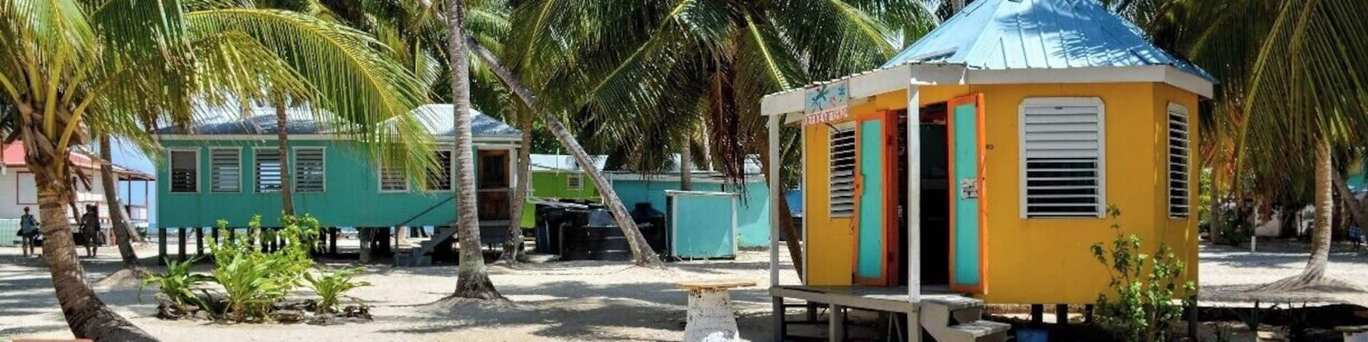 Tobacco Caye is a tiny bit of coral and sand anchored along Belize's barrier reef. The island is packed with bare-bones backpacker accommodations, and, judging by the number of beer bottles, sees lots of partying.