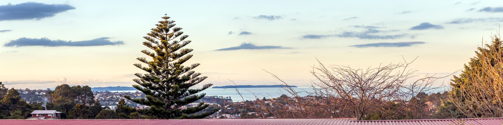 Rainbow view from the window in Browns Bay, Auckland, New Zealand