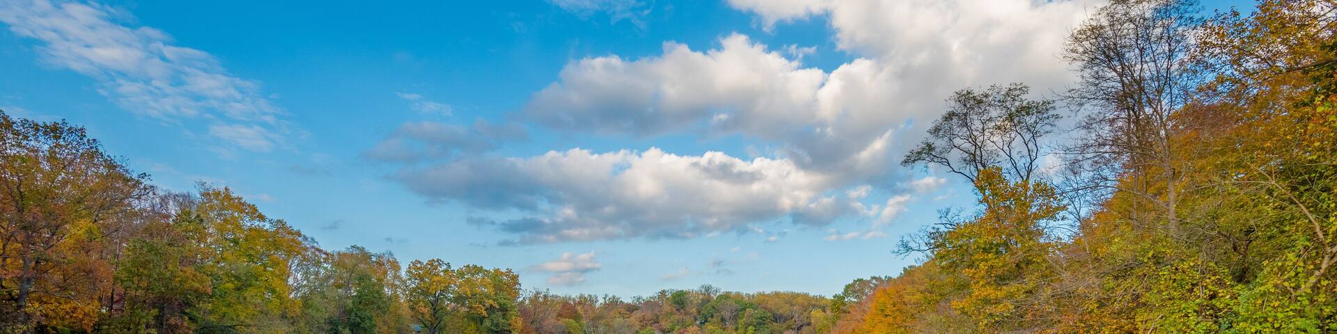 Autumn color at Lake Roland at Robert E Lee Park in Baltimore, Maryland