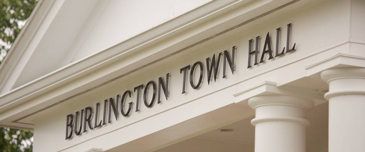 Burlington showing signage and an administrative building