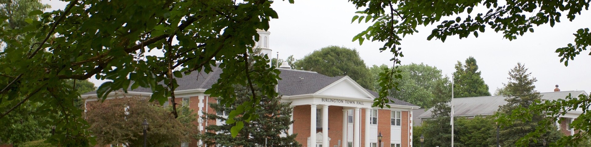 Burlington featuring an administrative buidling and a park