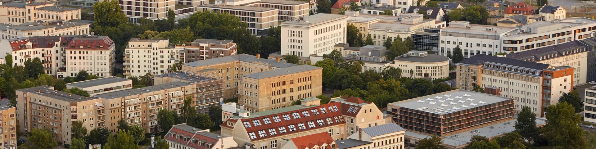 Elevated cityscape of the south of Leipzig with the Connewitz district at sunset; Shutterstock ID 624095156