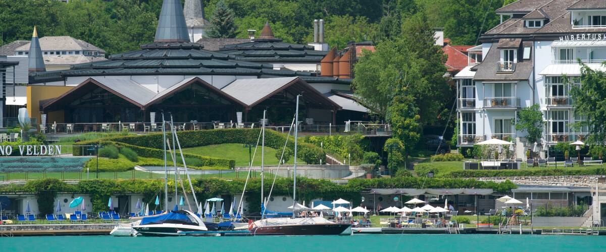 Casino Velden featuring a bay or harbor and a garden