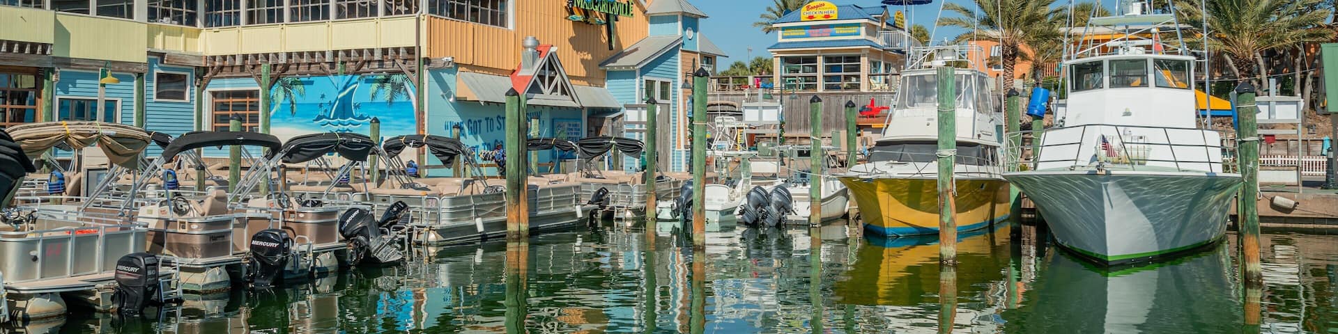 HarborWalk Village which includes a bay or harbor