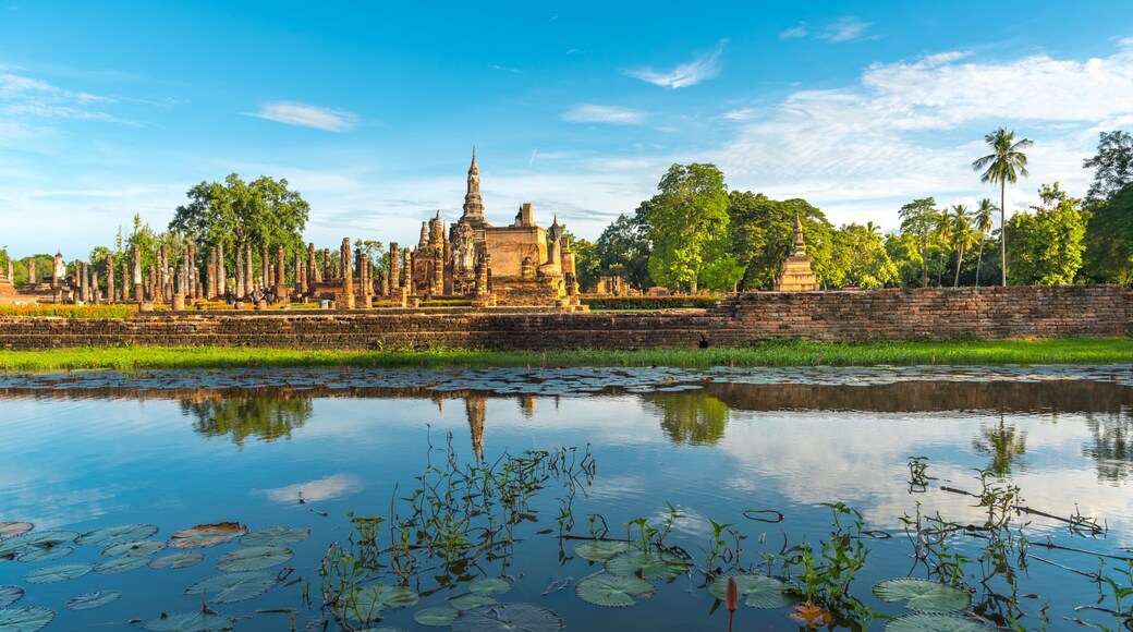 Sukhothai Historical Park featuring a pond