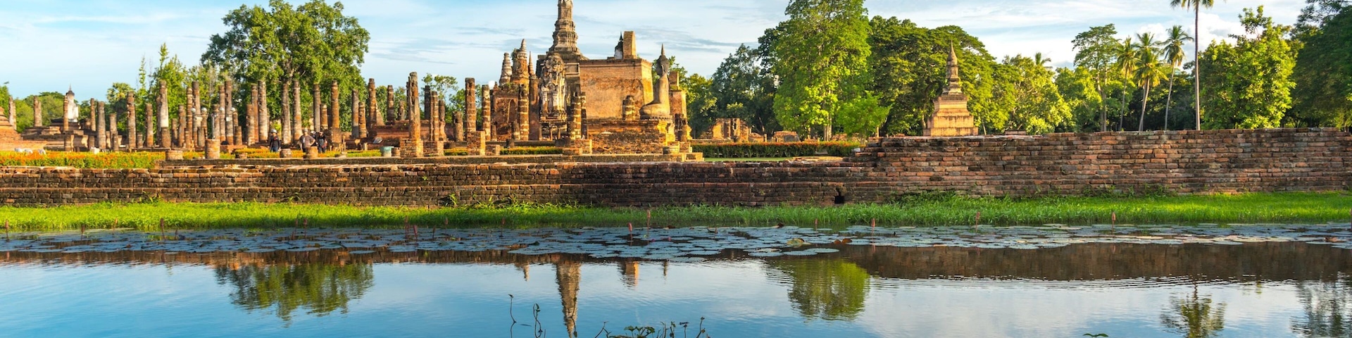 Sukhothai Historical Park featuring a pond