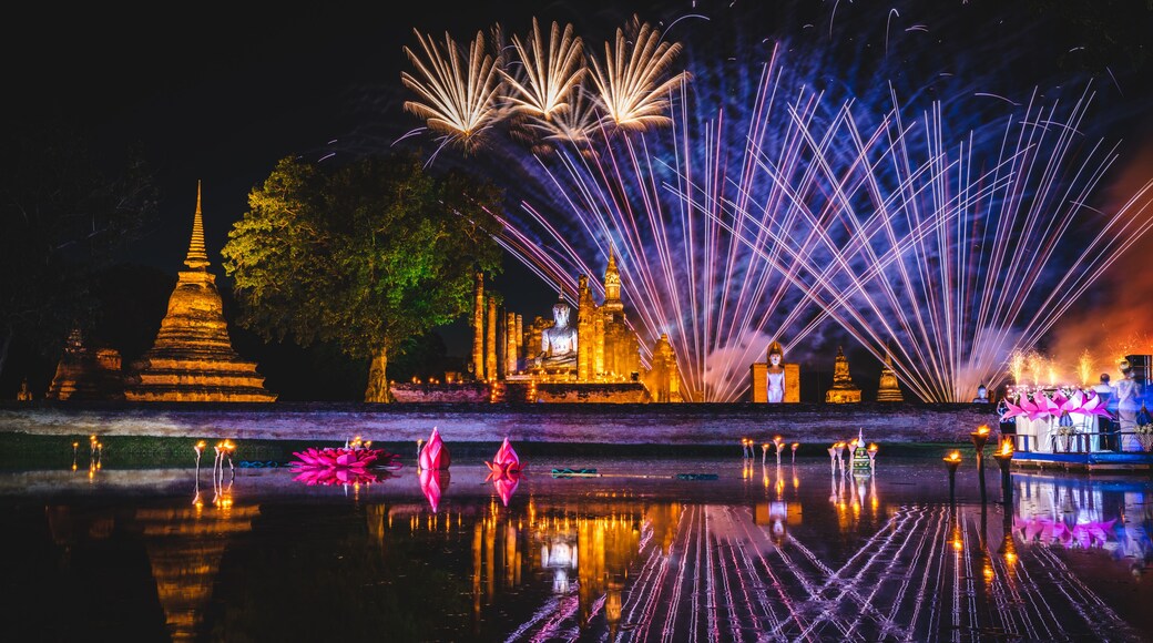 Firework at event of Loi Krathong festival showing in Sukhothai historical park, Thailand.