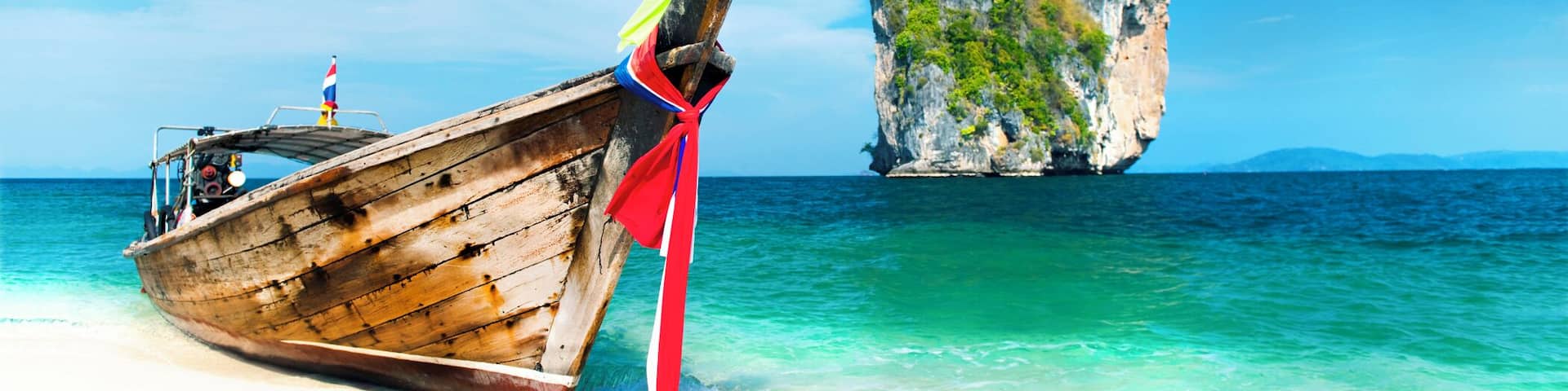 Paradise Island with a Longtail boat