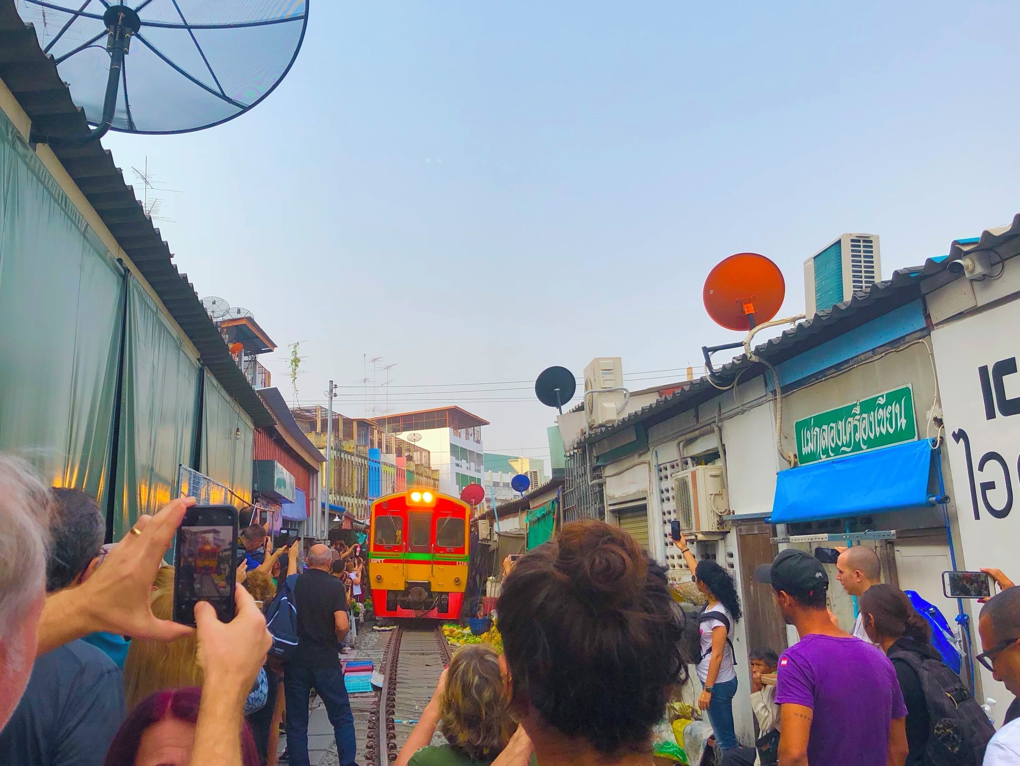 This is Maeklong Market held in front of Maeklong Railway Station. It is held on tracks.
Every time the train passes, people put away their tent and then set up again.
#Thailand