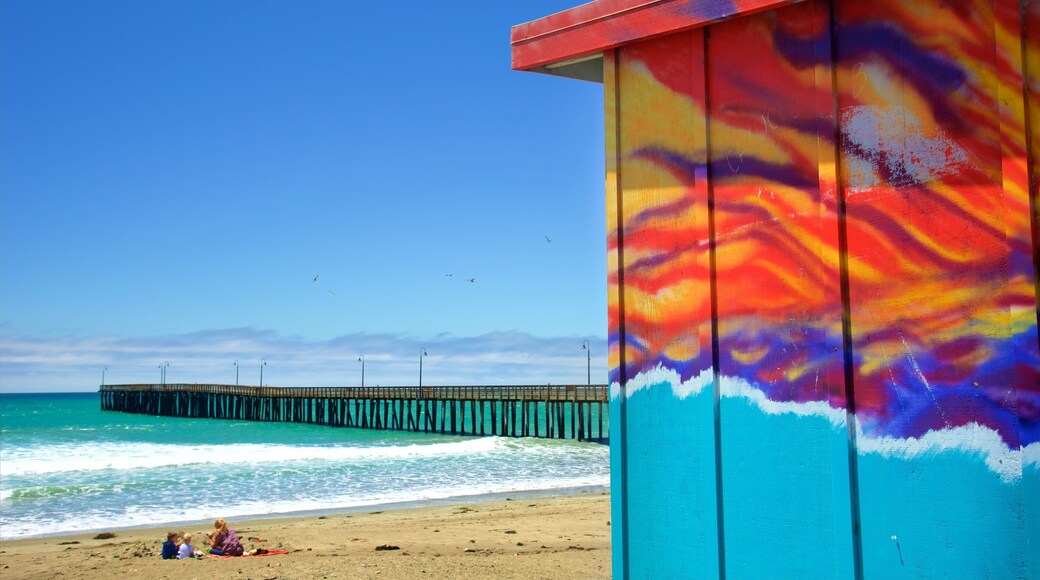 Cayucos State Beach which includes a sandy beach, general coastal views and outdoor art