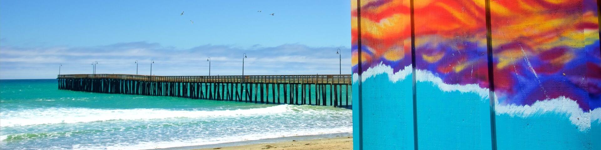 Cayucos State Beach which includes a sandy beach, general coastal views and outdoor art
