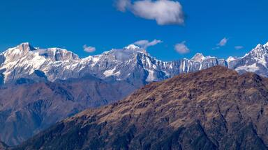 Panoramic view Himalayan mountains view from Chandrashila summit, Chopta. Chandrashila is a peak in the Himalayan ranges in Uttarakhand state of India. It lies at an altitude of 12,083 ft from the sea