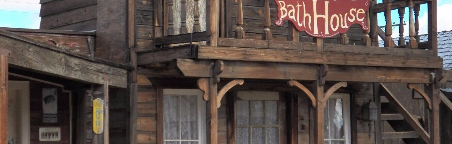 Pioneertown is located in Southern California near Joshua Tree National Park. While the "town" itself has been used as a set for TV shows and movies there are a small number of people living in the area around these buildings.
So, what you see in this picture is not and was not an actual hotel or bathhouse except on the screen. It is more fun to walk through this place than most movie studios in Los Angeles. #architecture