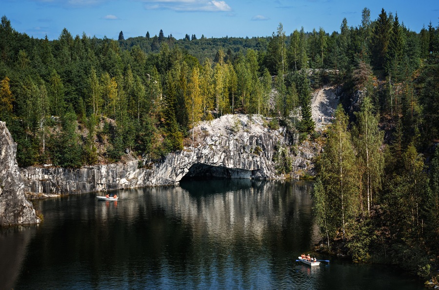 The marble quarry "Ruskeala" filled with groundwater. Nature of Karelia. Summer in the northern forests.