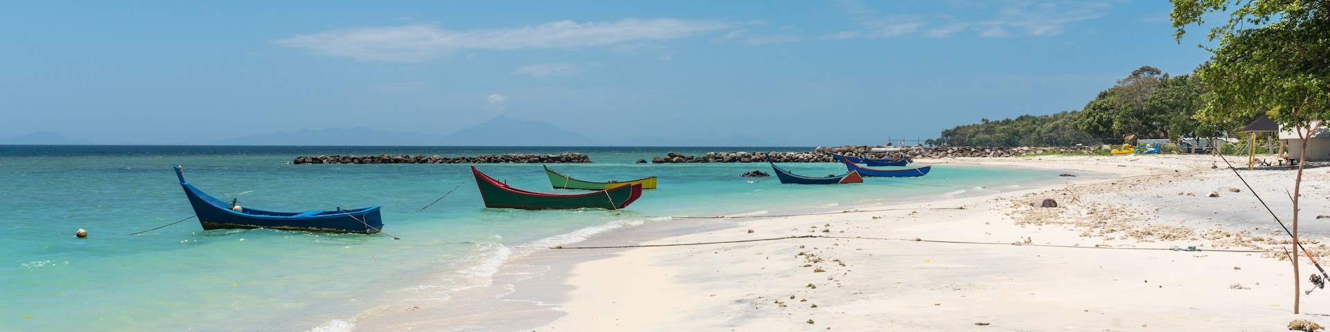 The village Pasir Putih with its dreamlike white sandy beach in the south of the Weh island, Sabang, the northernmost point of Indonesia