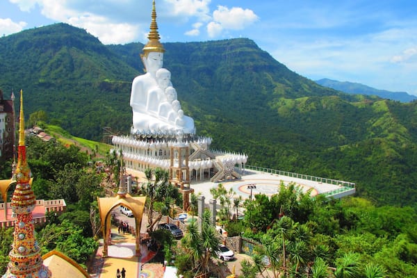 Located in north-central Thailand, Wat Pha Sorn Kaew sees a number of Thai tourists but is virtually unknown to most foreign travelers. There are two big draws here- the five sitting Buddhas, and the fantastic temple, which is covered in nearly five million mosaic tiles. Perched on an 830 meter high peak, it offers commanding views of its surroundings. The mountainous terrain and cooler climate have led many to call this area the "Little Switzerland of Thailand."
#thailand #landofsmiles #templetour #colorful