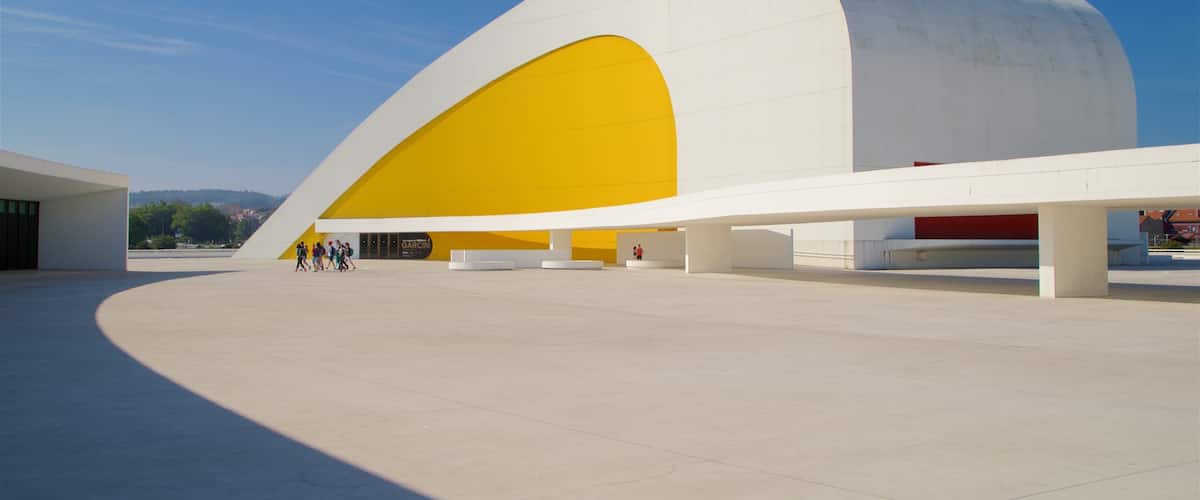 Oscar Niemeyer Cultural Centre showing modern architecture as well as a small group of people
