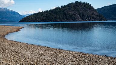 A photo of Copper Island taken from the North Shore of Shuswap Lake in British Columbia, Canada. The area is popular for kayaking and hiking.