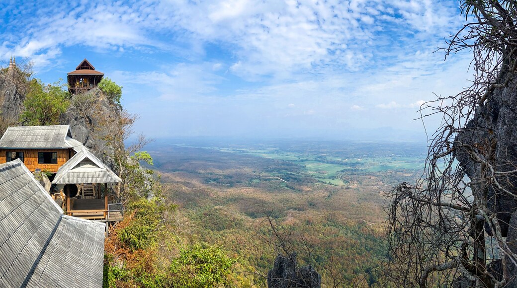 Aerial view of Wat Chaloem Phra Kiat Phrachomklao Rachanusorn, sky pagodas on top of mountain in Lampang Thailand