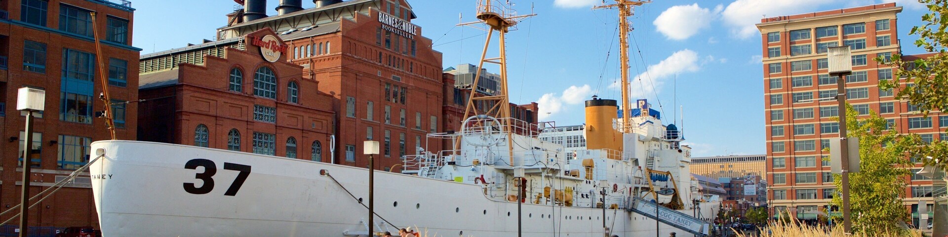 USCGC Taney featuring a marina and heritage architecture