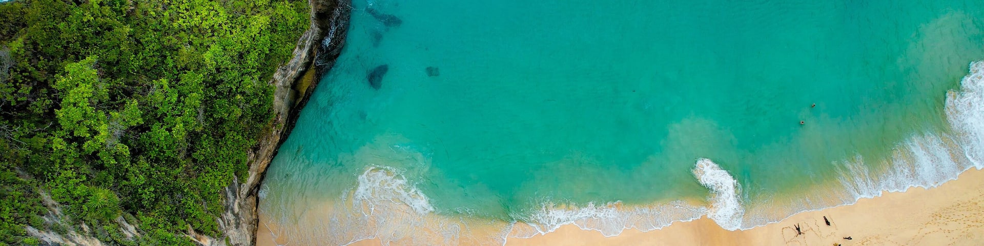 Drone Aerial Famous Kelingking Beach in Nusa Penida, Indonesia Zoom Shot