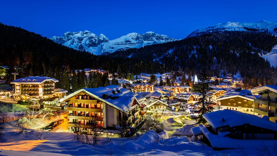 Illuminated Ski Resort of Madonna di Campiglio in the Morning, Italian Alps, Italy