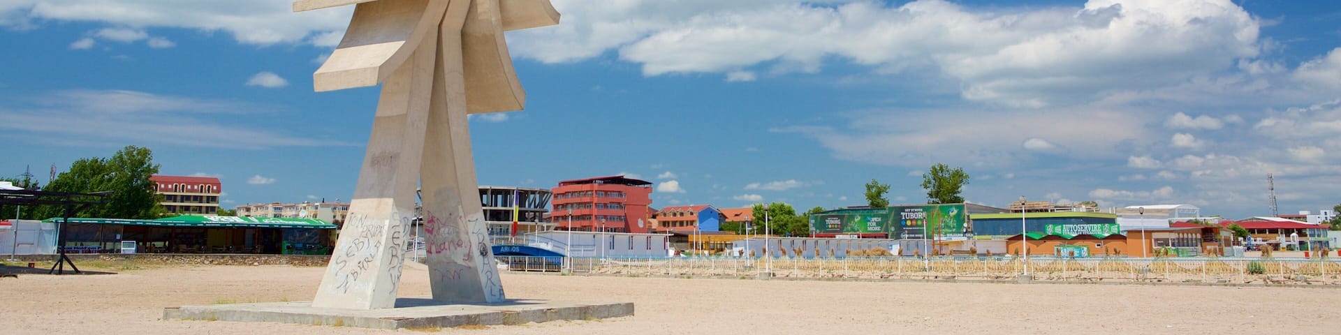 Obelisk showing a beach and outdoor art