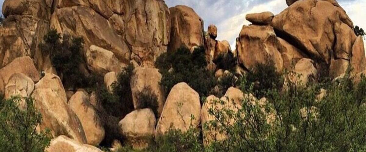 Texas Canyon in Arizona! Sometimes when you're driving..... You see something so awesome you just have to climb it! Does anyone see the "lips" at the top??