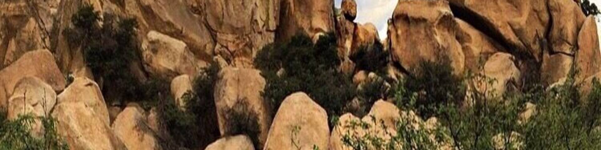 Texas Canyon in Arizona! Sometimes when you're driving..... You see something so awesome you just have to climb it! Does anyone see the "lips" at the top??