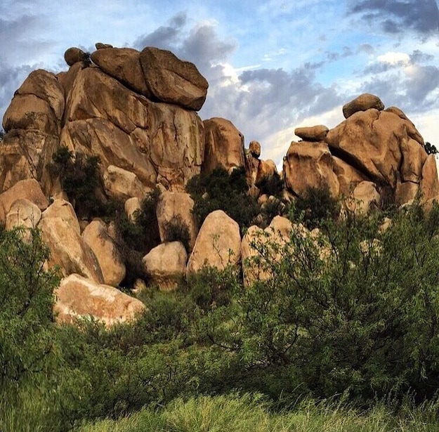 Texas Canyon in Arizona! Sometimes when you're driving..... You see something so awesome you just have to climb it! Does anyone see the "lips" at the top??