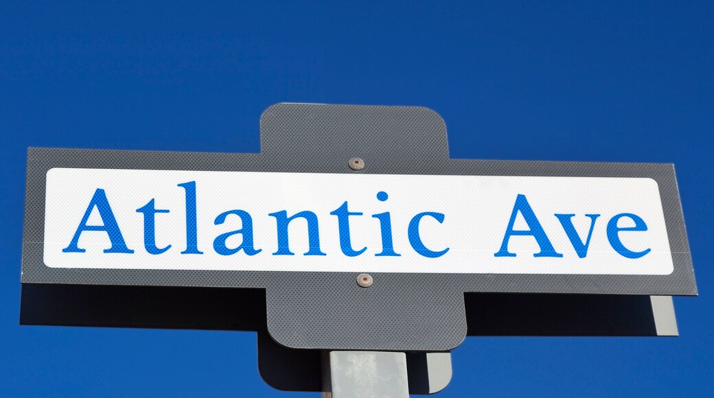 Atlantic Avenue sign under blue sky. The East Coast's most funnest summer avenue!