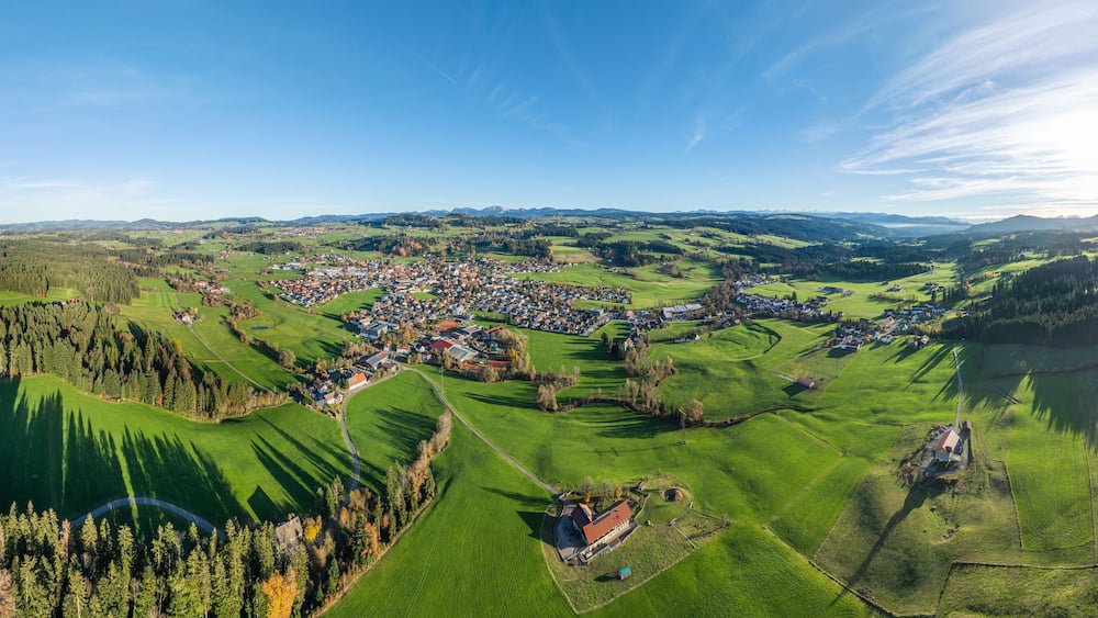 Aerial photo at sunset of the village of Weiler-Simmerberg, district Simmerberg in the western Allgaeu in Bavaria, Germany