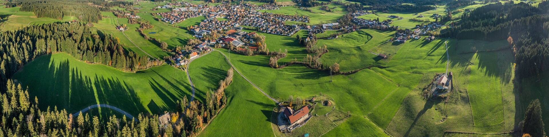 Aerial photo at sunset of the village of Weiler-Simmerberg, district Simmerberg in the western Allgaeu in Bavaria, Germany