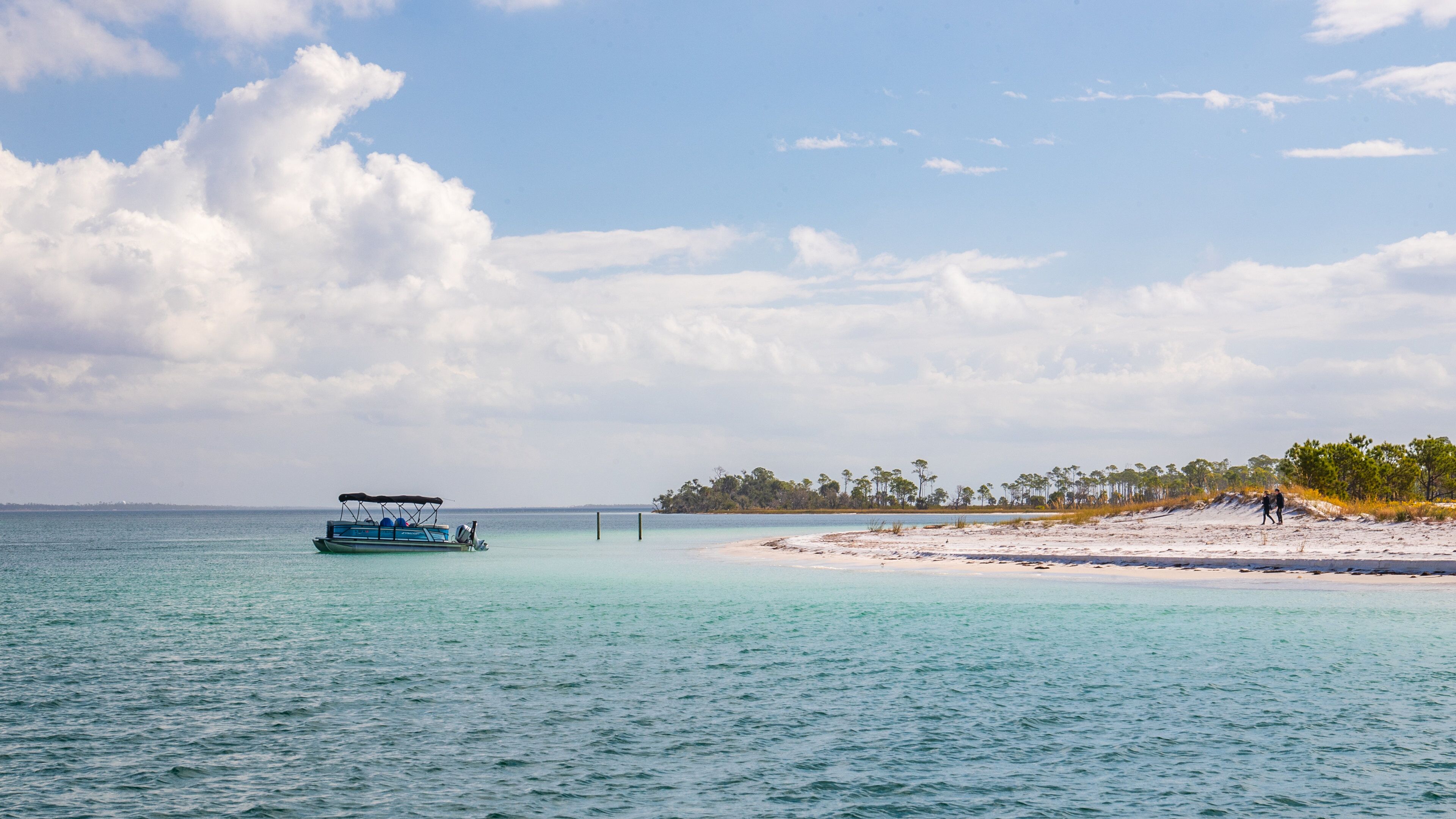 Shell Island which includes boating and general coastal views
